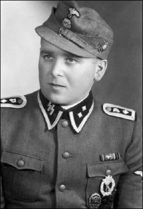 An unidentified SS-Oberscharführer of anti-tank troops within a mountain ...
