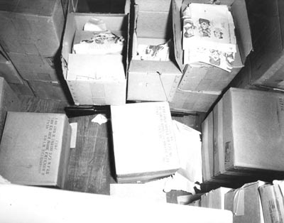 The sniper nest on the 6th floor of the Book Depository, and the position in which the rifle was allegedly found.