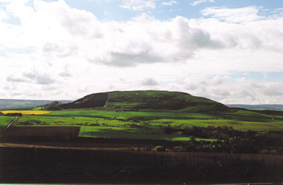 Traprain Law, a sacred hill that is the focus of a sacred landscape in East Lothian, surrounded by megalithic stones