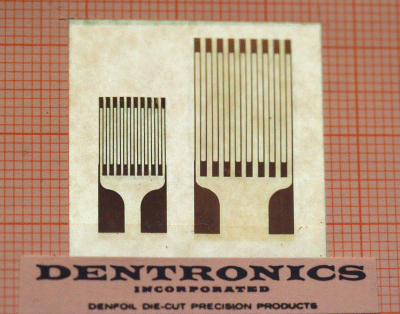 Photograph depicting die-cut strain gages manufactured by Dentronics Inc. in the 1960s.