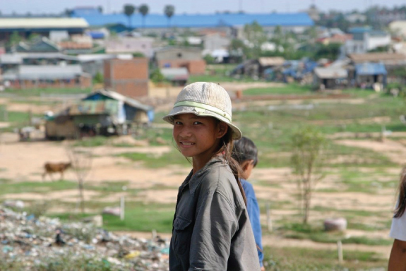 Photograph of a girl at the Phnom Penh dump, Cambodia, taken in the year 2007.